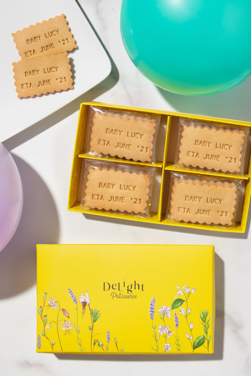personalized shortbread cookies in elegant yellow floral gift box for baby shower gift