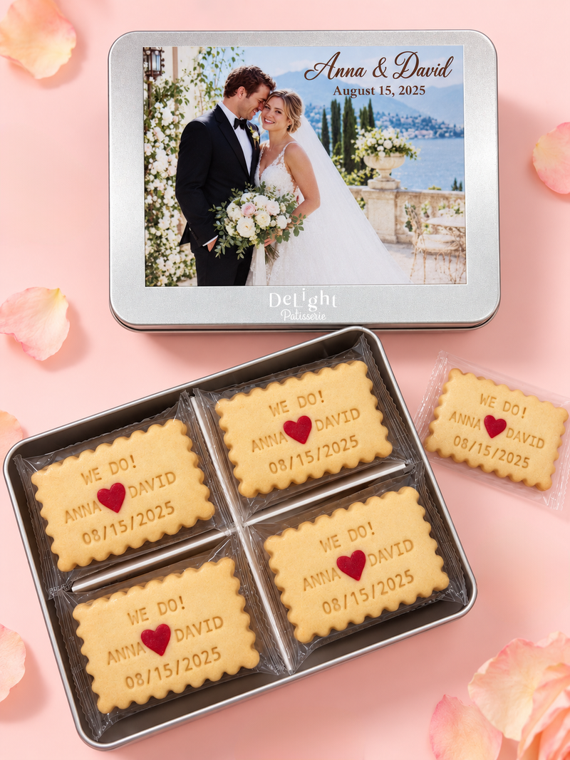 Custom cookie tin featuring a couple’s photo, filled with personalized shortbread stamped with their names and wedding date—a wedding gift or anniversary gift.
