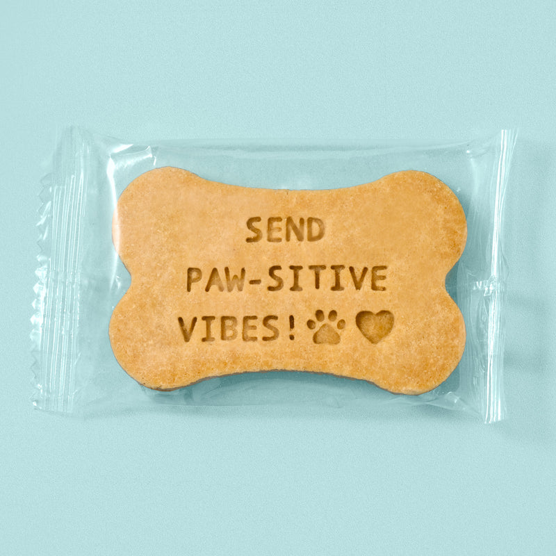 Individually wrapped custom message dog biscuit with paw and heart emoji stamps - bulk personalized dog treats for dog lovers and pet-friendly business