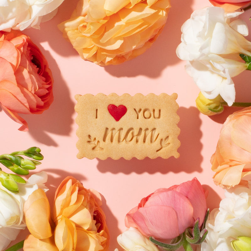 I LOVE YOU MOM shortbread cookie with a red sugar sprinkle for mother's day gift