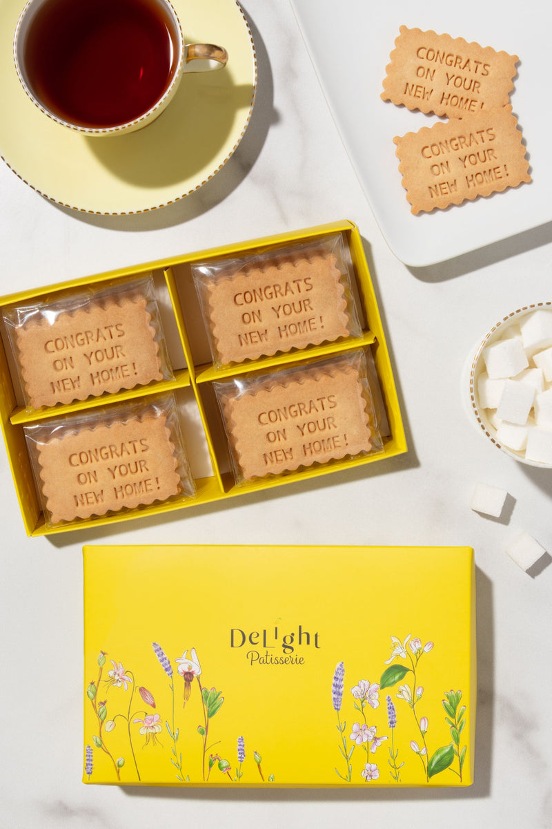 Custom shortbread cookies in elegant yellow floral gift box for new home gift used by real estate