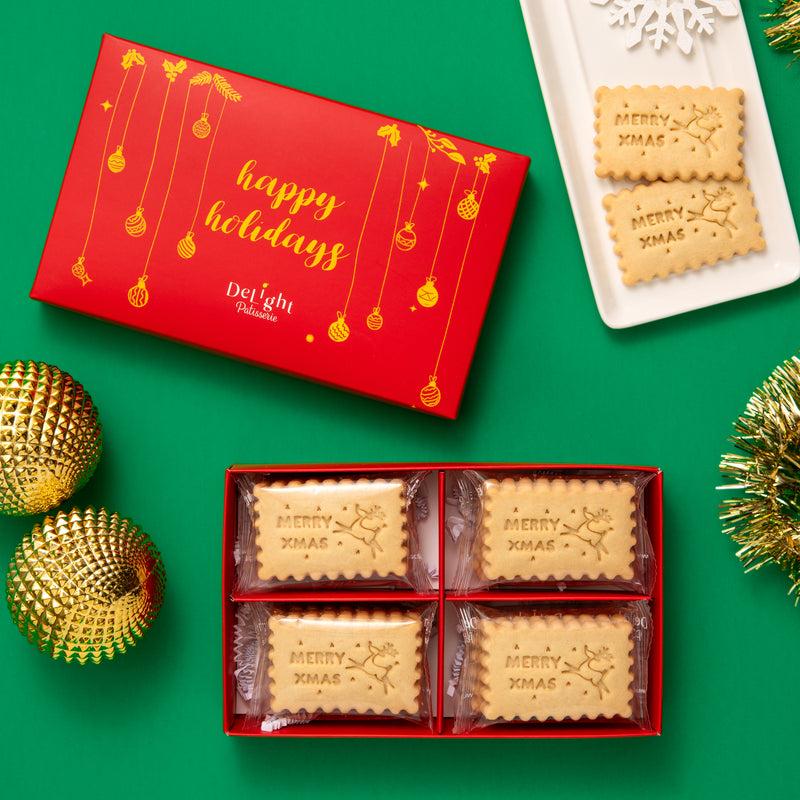 Merry Christmas shortbread cookies in red holiday gift box