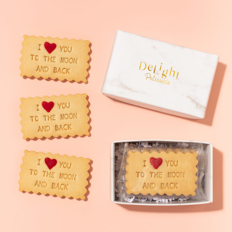 Love You To The Moon shortbread cookie mini gift box with 6 stamped I Love You cookies in white marble packaging for Valentine's Day